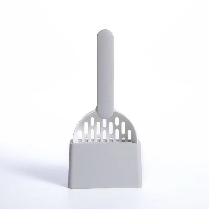 white cat litter scoop